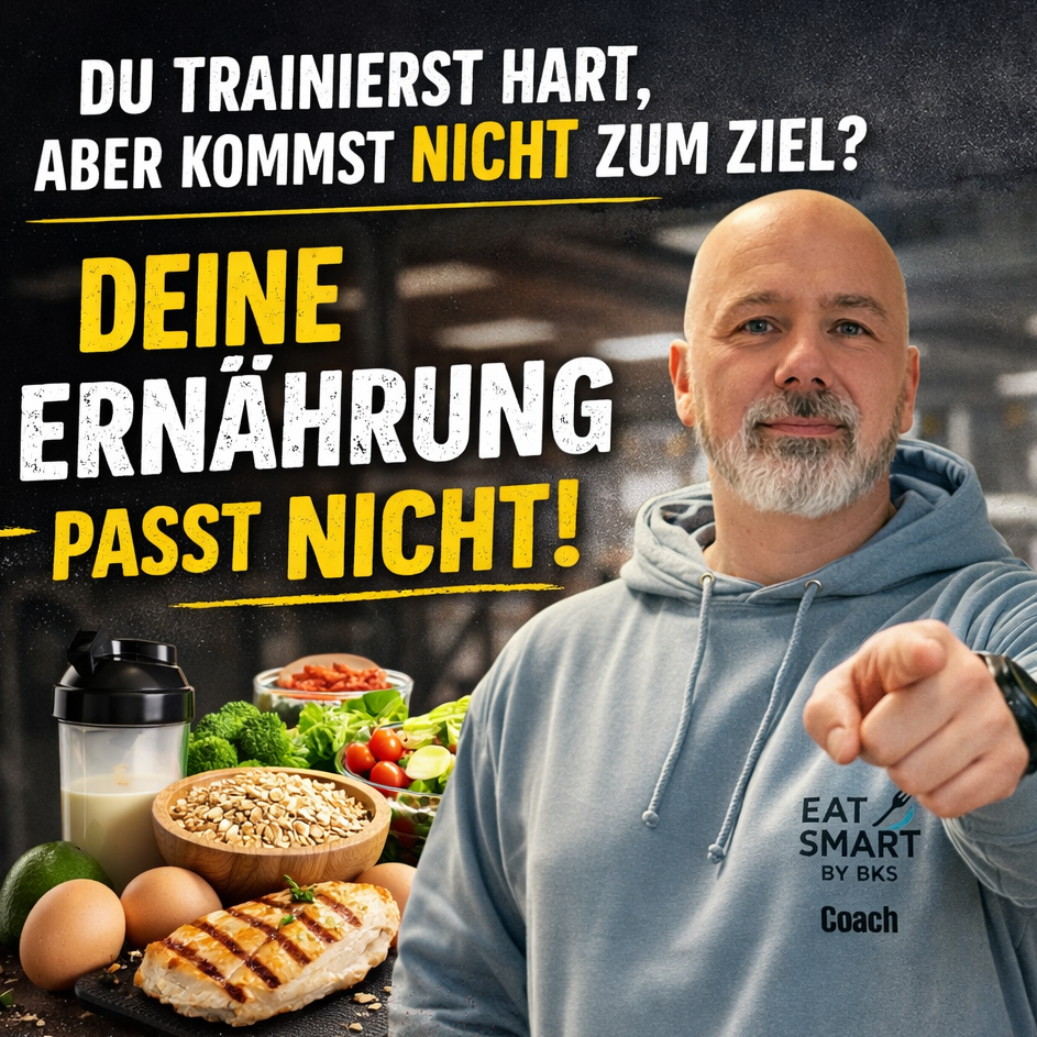 Ein Mann mit grauem Bart in einem Hoodie steht vor gesunden Lebensmitteln und Werbung.